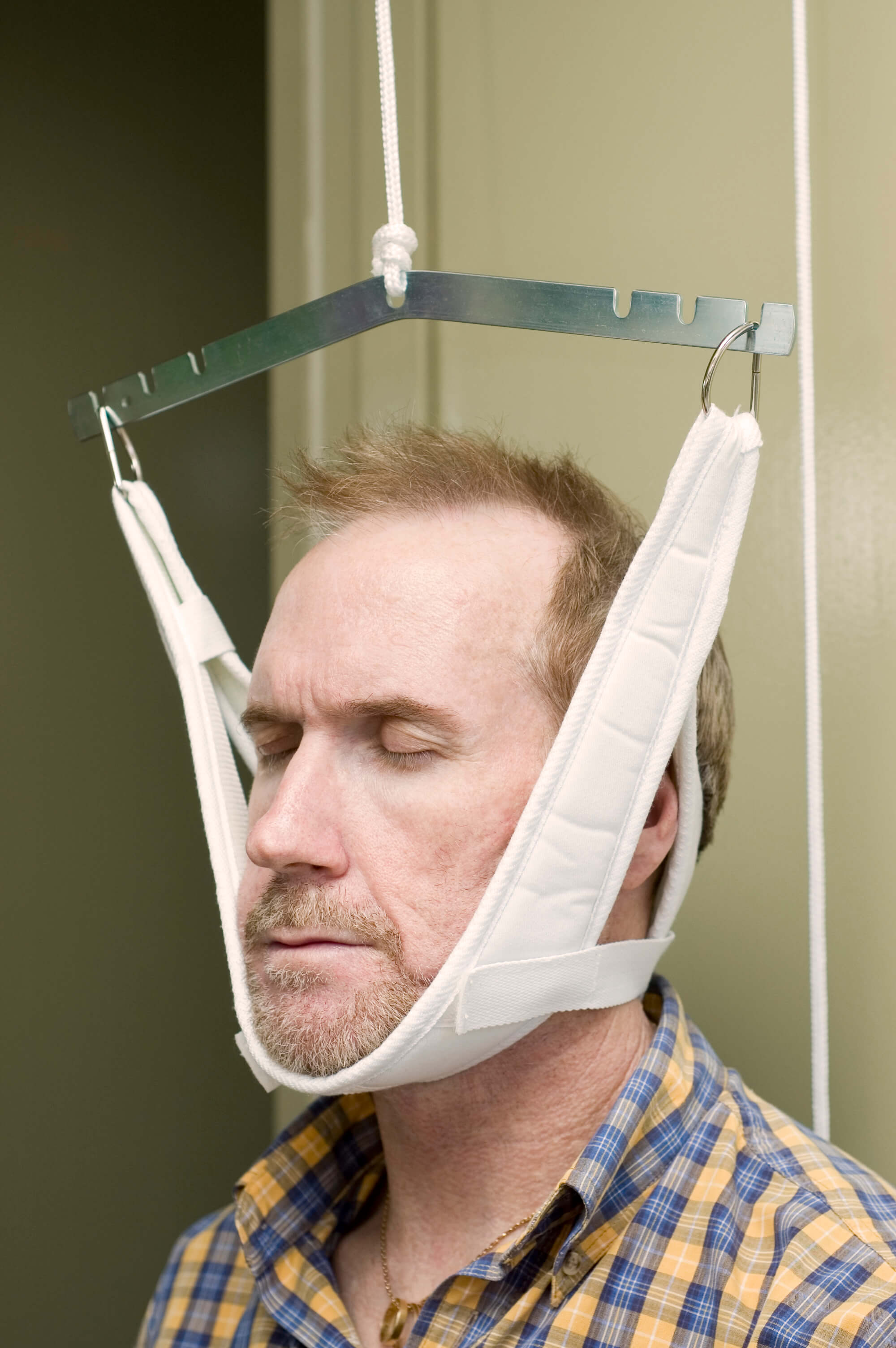 Neck rehabilitation with traction
